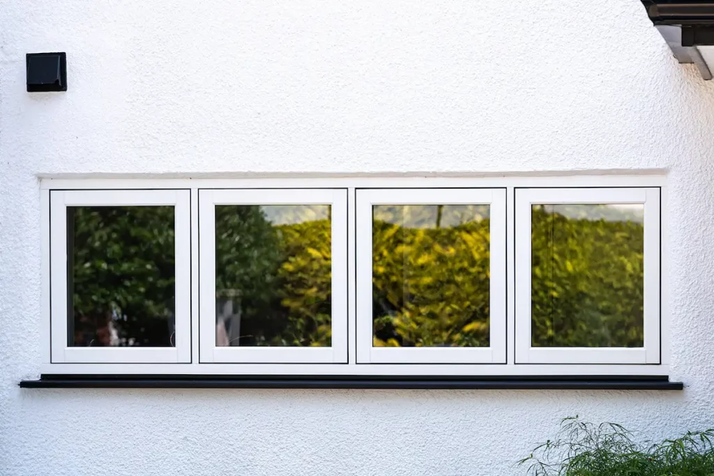 How Local Window and Door Installers Solve Snagging Issues Faster Than National Firms 4 small white upvc flush sash windows