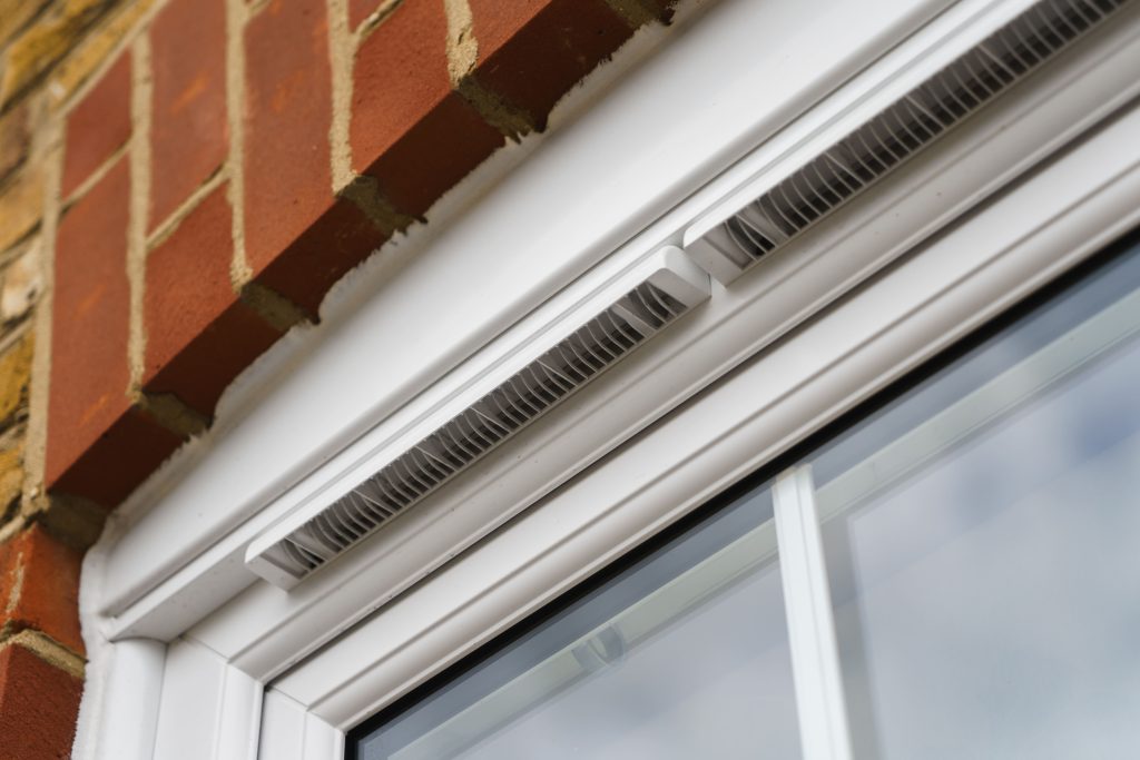 ECOSlide vertical sliding windows sit proudly on a traditional property in Hornchurch, UK. These windows are white.