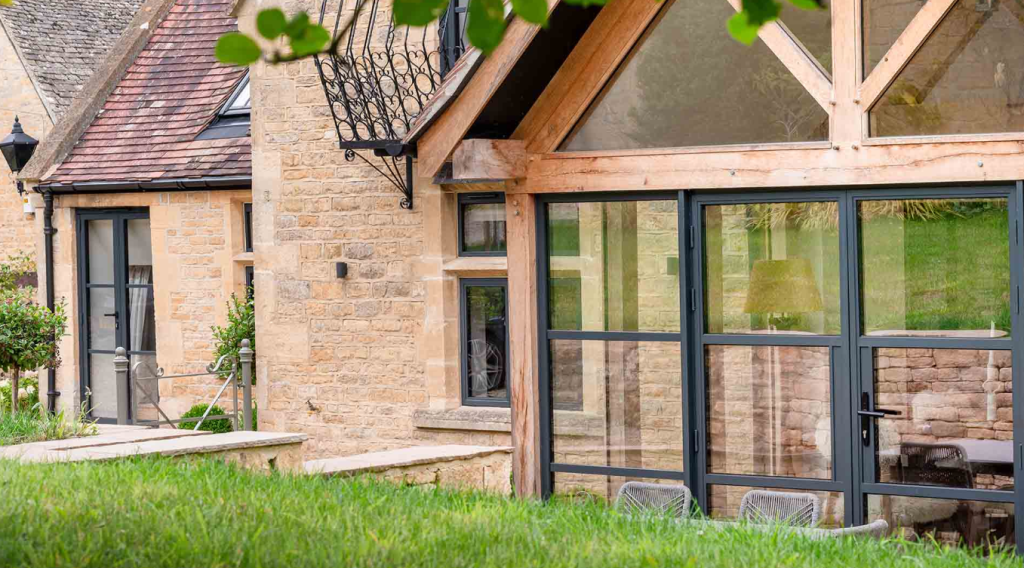 How Local Window and Door Installers Solve Snagging Issues Faster Than National Firms 3 Decorio External Doors are made using aluminium, providing extensive natural light intake. These doors are finished in black.